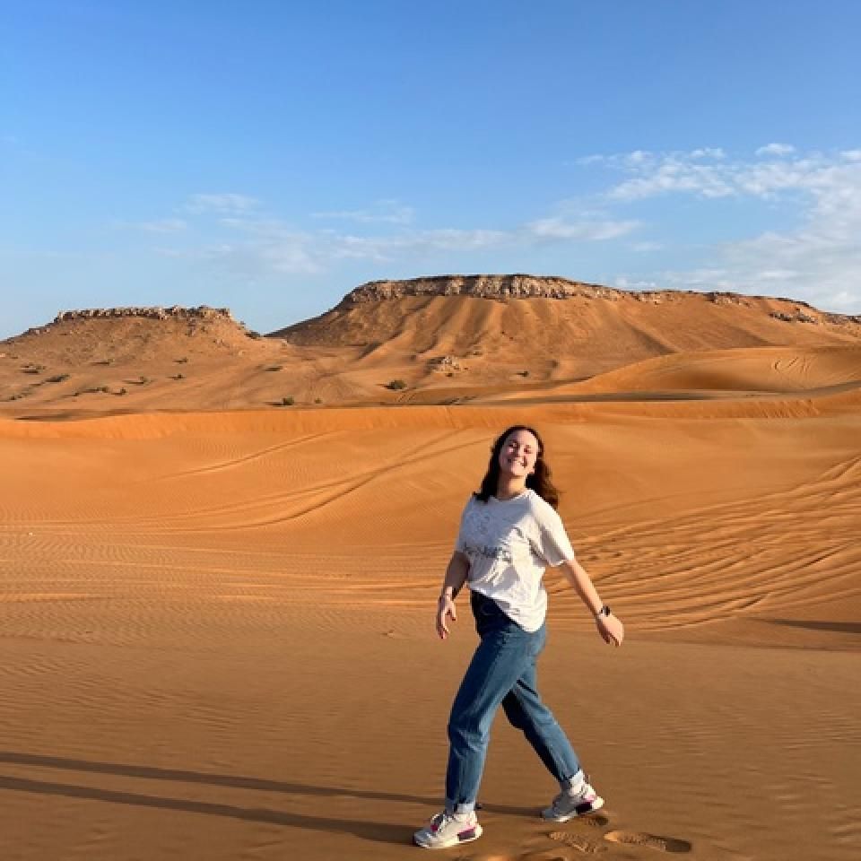 Gia Levis smiles in the sands of Dubai.