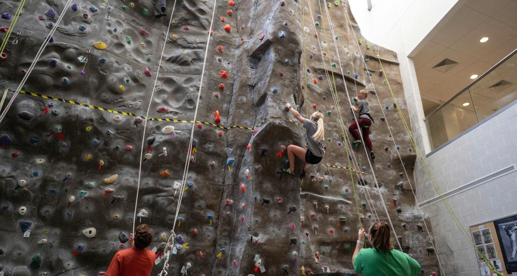 students in rock climbing class