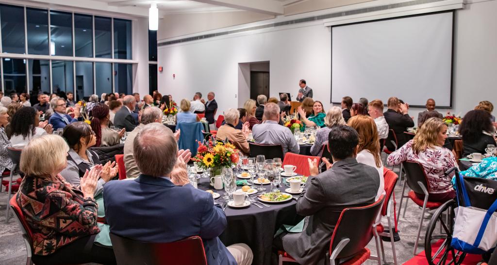 People gathered at an event at York College
