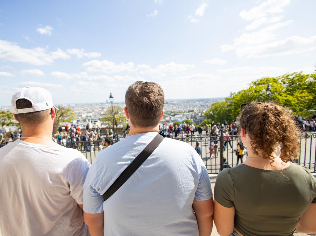 3 students in London and Paris engaging a view.