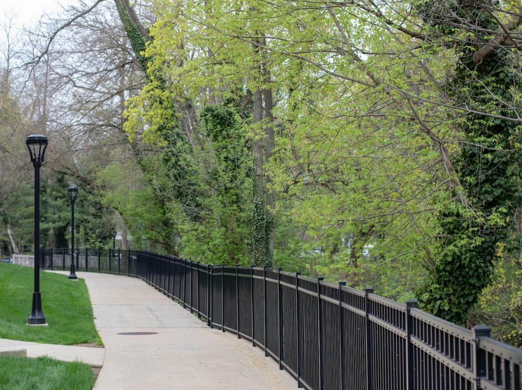 A walkway leading to Northside Commons on a cloudy day.