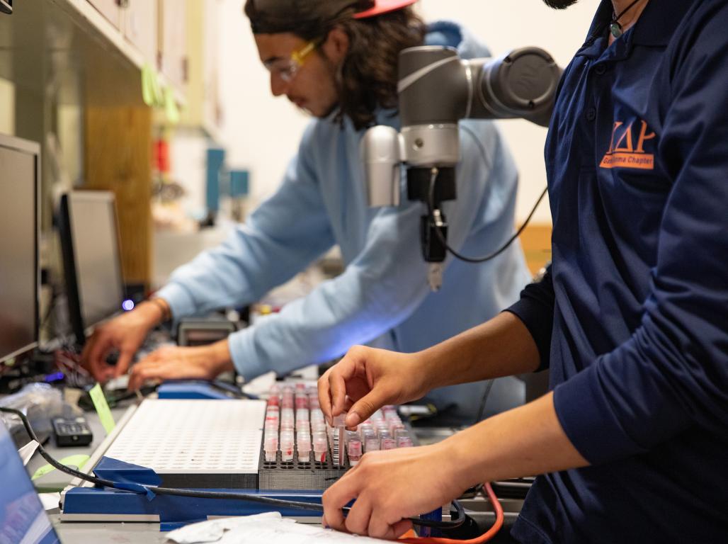 Two students work at lab station computers in the MRG labs at the J.D. Brown Center of York College of Pennsylvania.