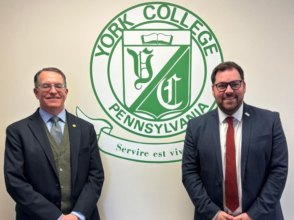 York College President Dr. Thomas Burns stands side by side with Dr. Ken Merry, Principal and Chief Executive of York College & University Centre