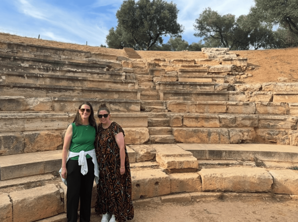 Erin Titter and Kristen Gurreri pose together in Greece for the York College international fundraising conference