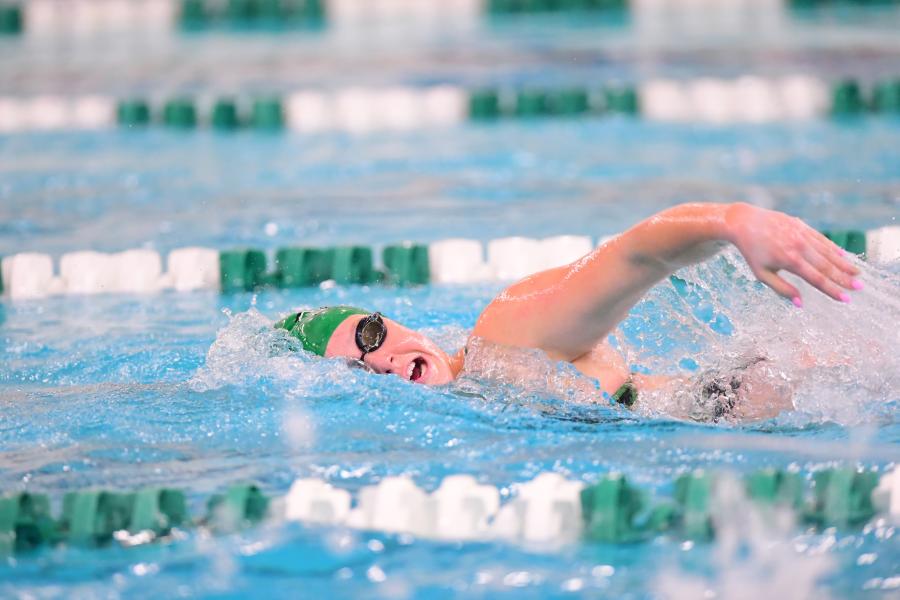 Swimmer takes a breath during a competitive event.