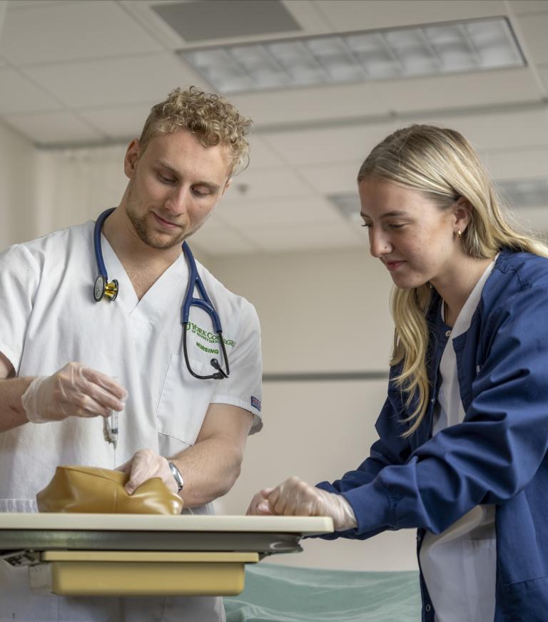 Students in York College's bachelor's in nursing program learn injection techniques in the clinical nursing simulation lab.