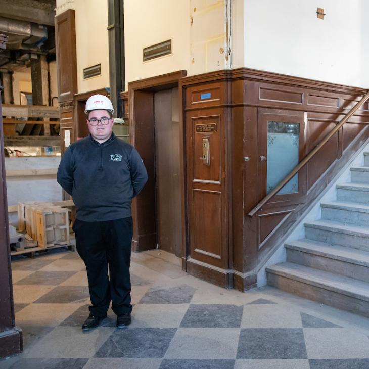 A student in the Yorktowne Hotel helping with construction.
