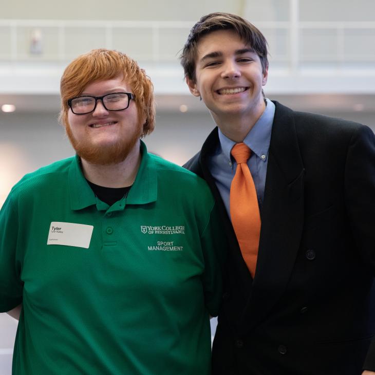Two students at the Career Expo on campus