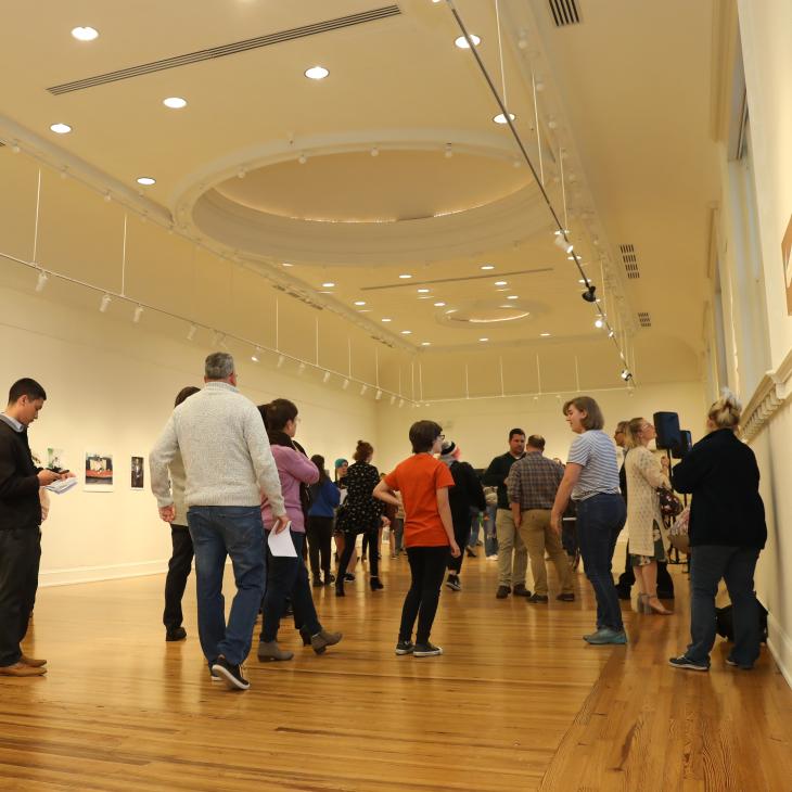 Marketview arts wide shot with a crowd a people