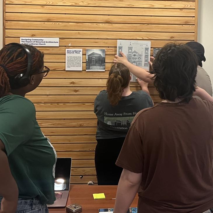 Students review historic photos of Mt. Zion Church