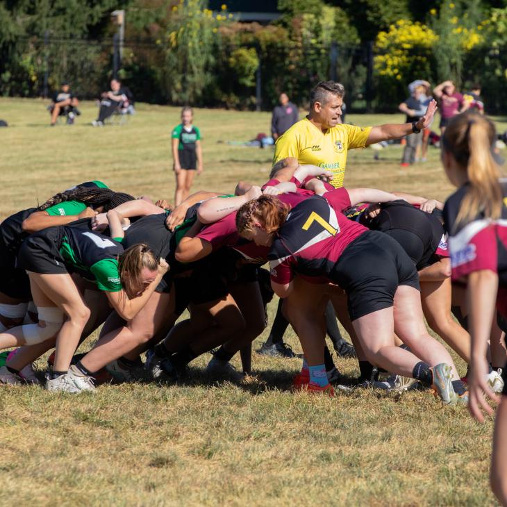 Women's Rugby tackle.